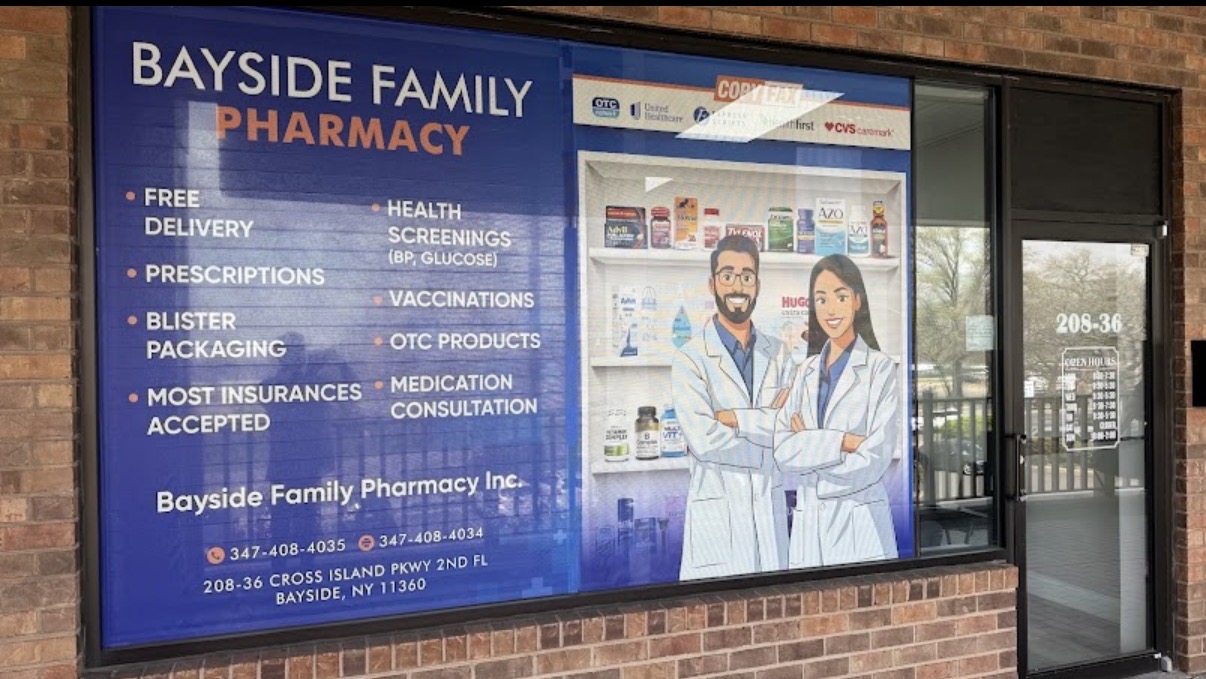 Bayside Family Pharmacy storefront window on Cross Island Parkway